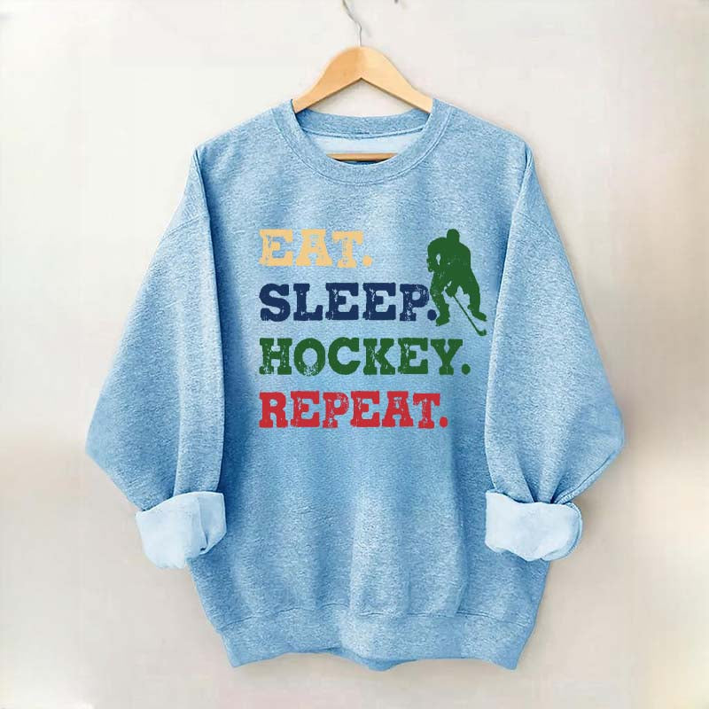 Eat Sleep Hockey Repeat Sweatshirt