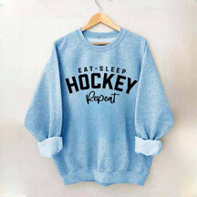 Eat Sleep Hockey Repeat Sweatshirt