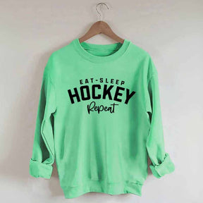Eat Sleep Hockey Repeat Sweatshirt