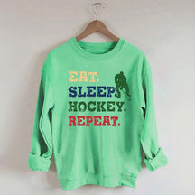 Eat Sleep Hockey Repeat Sweatshirt