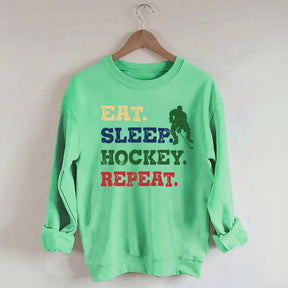 Eat Sleep Hockey Repeat Sweatshirt