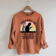 That's What I Do I Pet Cats I Read Books And I Know Things Sweatshirt