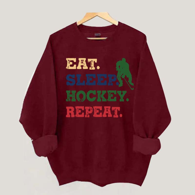 Eat Sleep Hockey Repeat Sweatshirt