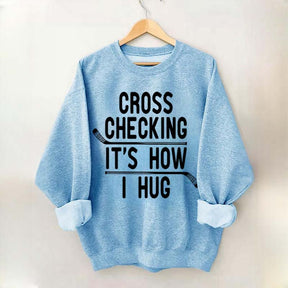 Cross Checking It's How I Hug Sweatshirt