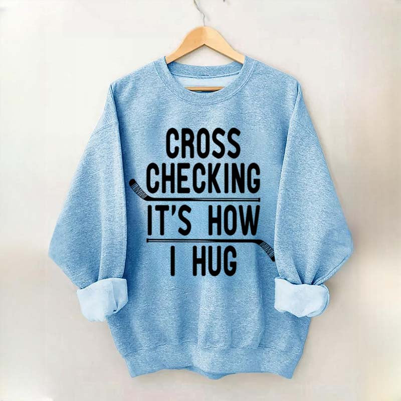 Cross Checking It's How I Hug Sweatshirt