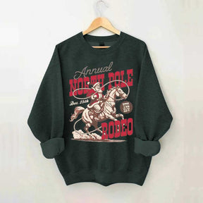 Annual North Pole Rodeo Western Christmas Sweatshirt