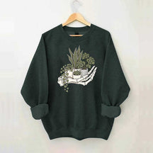 Skeleton Hand Cradling Potted Plants Sweatshirt