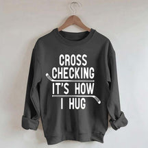 Cross Checking It's How I Hug Sweatshirt