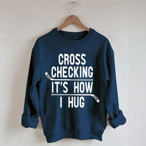 Cross Checking It's How I Hug Sweatshirt