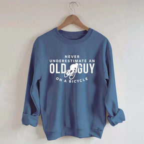 Never Underestimate An Old Guy On A Bicycle Sweatshirt