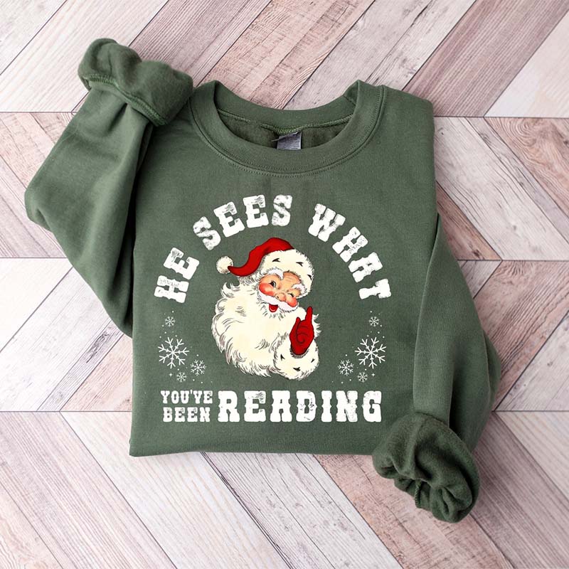 He Sees What You've Been Reading Santa Sweatshirt