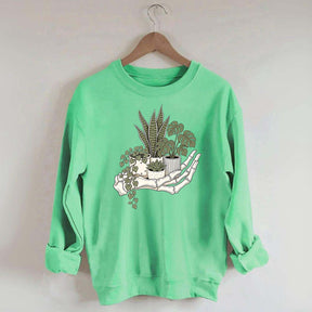Skeleton Hand Cradling Potted Plants Sweatshirt