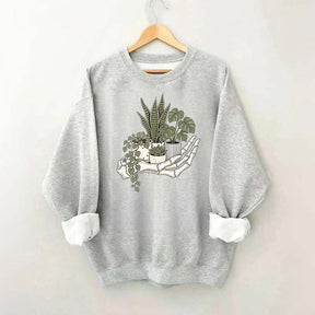 Skeleton Hand Cradling Potted Plants Sweatshirt