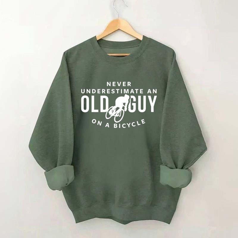 Never Underestimate An Old Guy On A Bicycle Sweatshirt