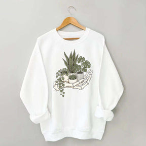 Skeleton Hand Cradling Potted Plants Sweatshirt