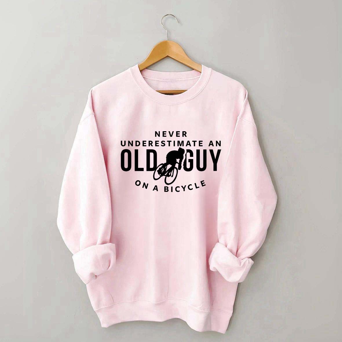 Never Underestimate An Old Guy On A Bicycle Sweatshirt