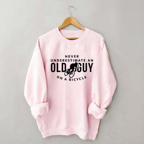 Never Underestimate An Old Guy On A Bicycle Sweatshirt