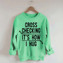 Cross Checking It's How I Hug Sweatshirt
