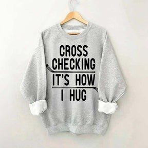 Cross Checking It's How I Hug Sweatshirt