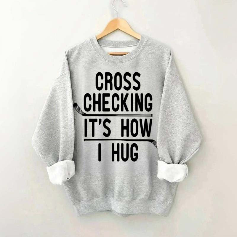 Cross Checking It's How I Hug Sweatshirt