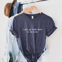 I Put My Book Down To Be Here T-Shirt