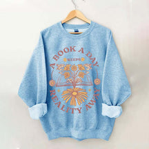 A Book A Day Keeps Reality Away Sweatshirt