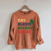 Eat Sleep Hockey Repeat Sweatshirt