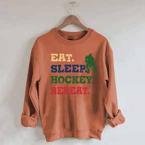 Eat Sleep Hockey Repeat Sweatshirt