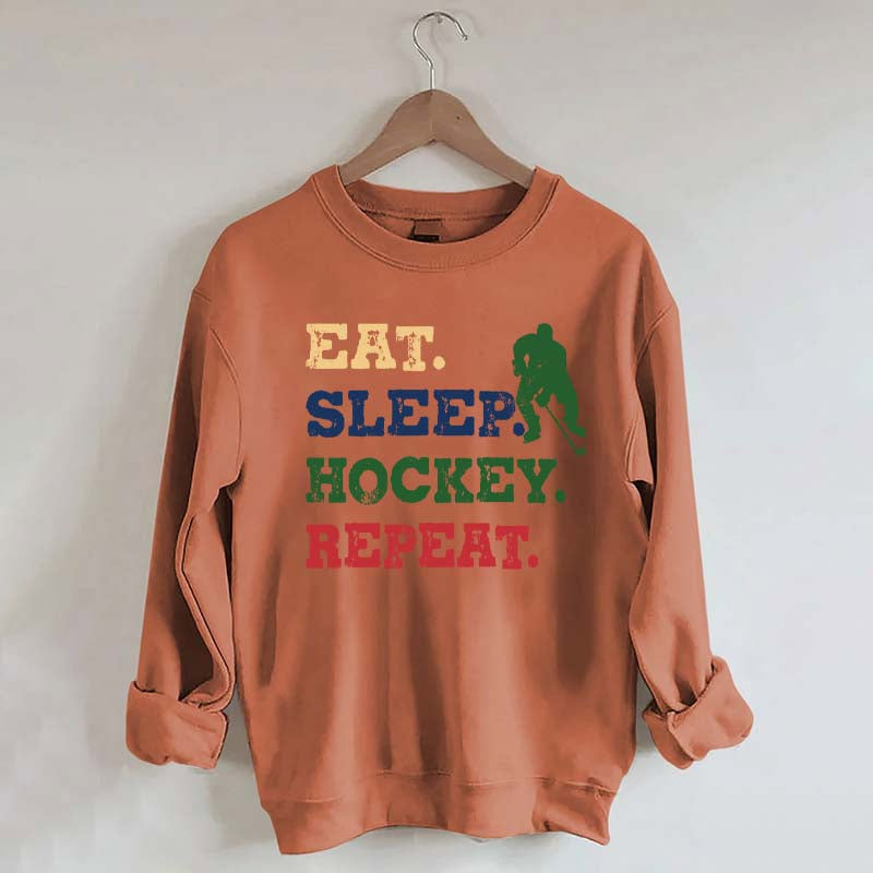 Eat Sleep Hockey Repeat Sweatshirt