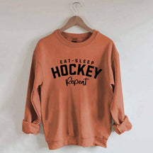 Eat Sleep Hockey Repeat Sweatshirt