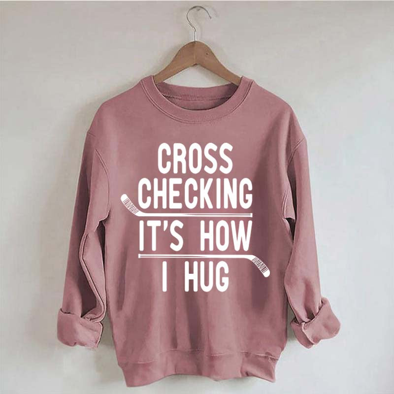 Cross Checking It's How I Hug Sweatshirt