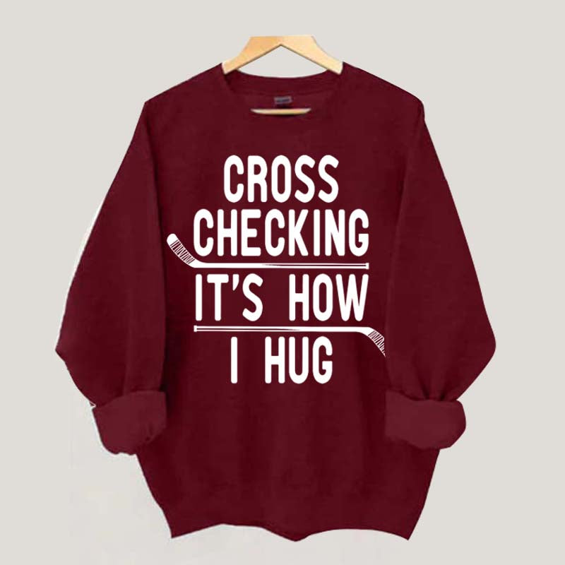 Cross Checking It's How I Hug Sweatshirt