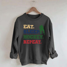Eat Sleep Hockey Repeat Sweatshirt