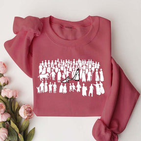 Woman Touches Religous Sweatshirt