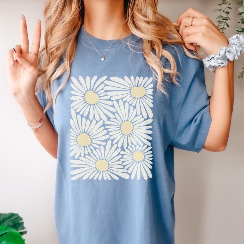 Gänseblümchen-Blumen-Trend-Grafik-T-Shirt