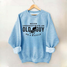 Never Underestimate An Old Guy On A Bicycle Sweatshirt