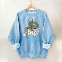 Skeleton Hand Cradling Potted Plants Sweatshirt